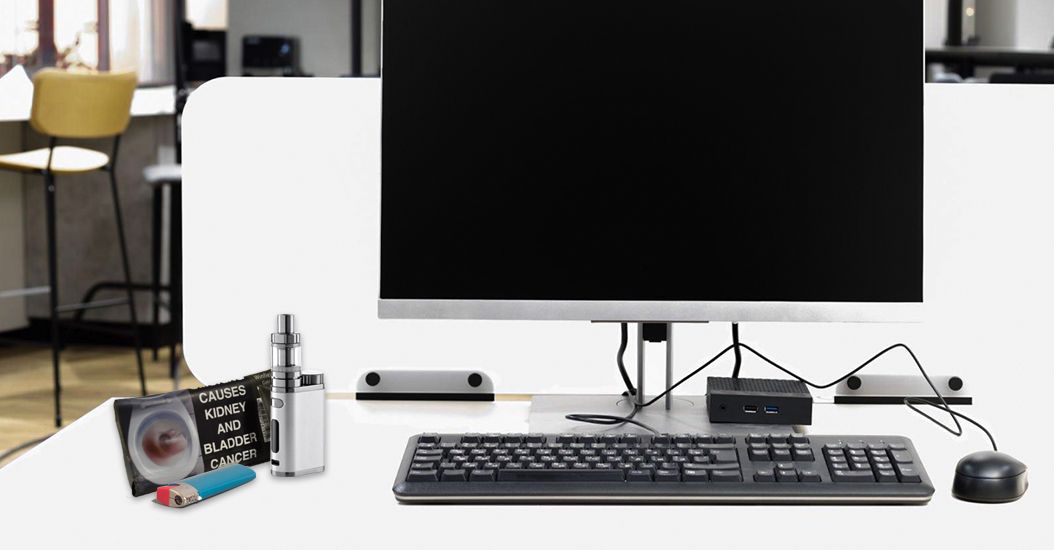 Desk with vape and rollies must belong to pretty cool guy